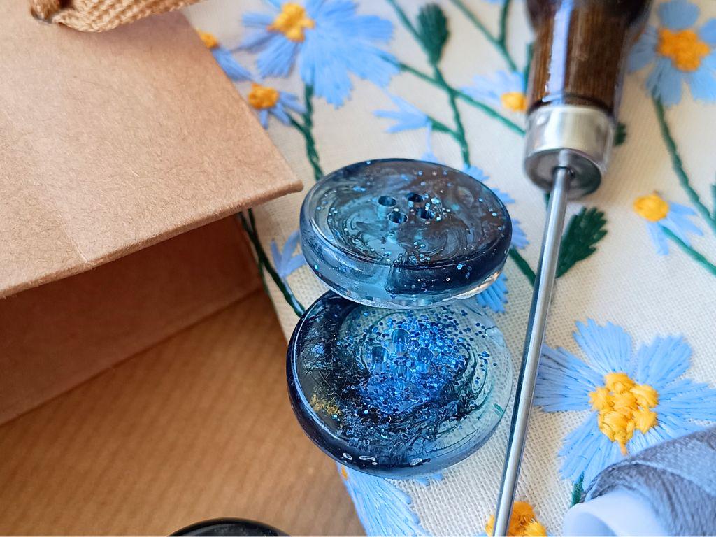 Handmade buttons for sewing, knitting or crocheting projects. Set of 4 buttons. Approx. 25 mm in diameter. Navy blue with glitter.