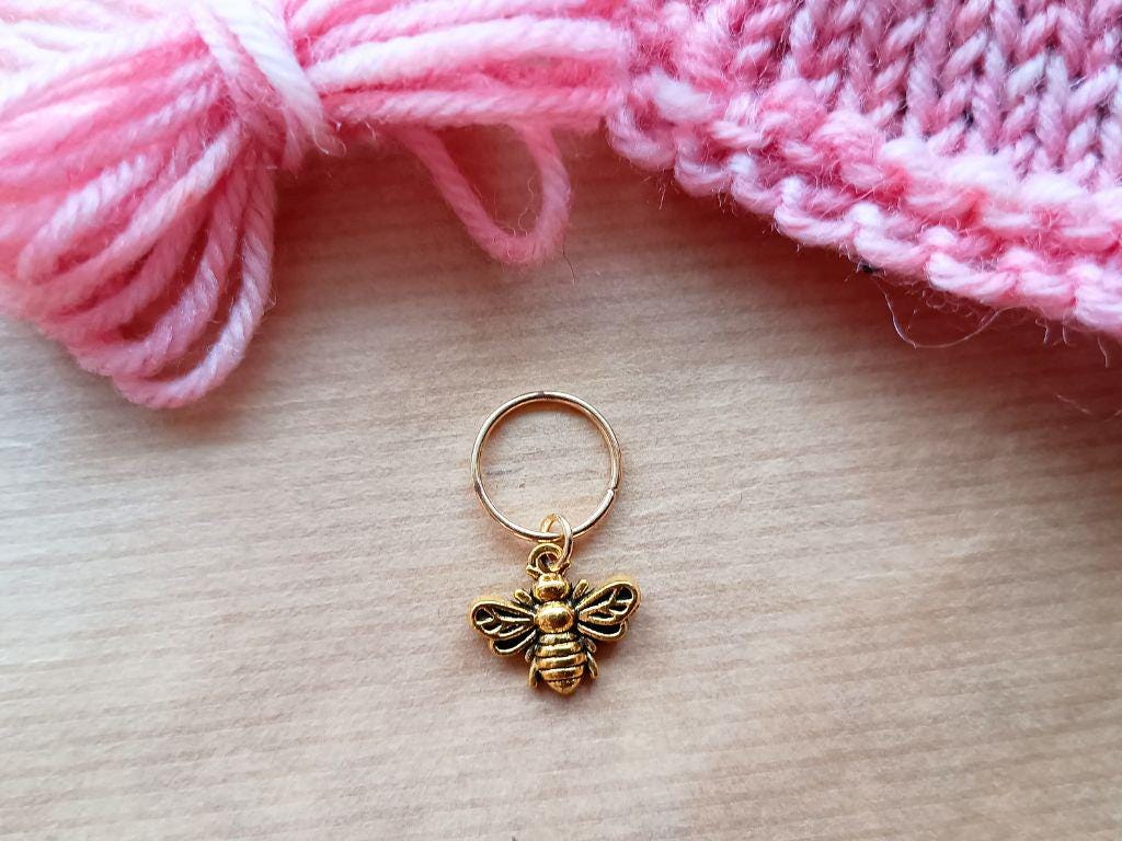 Stitch marker set of 5 with pendants and beads for knitting and crochet projects.