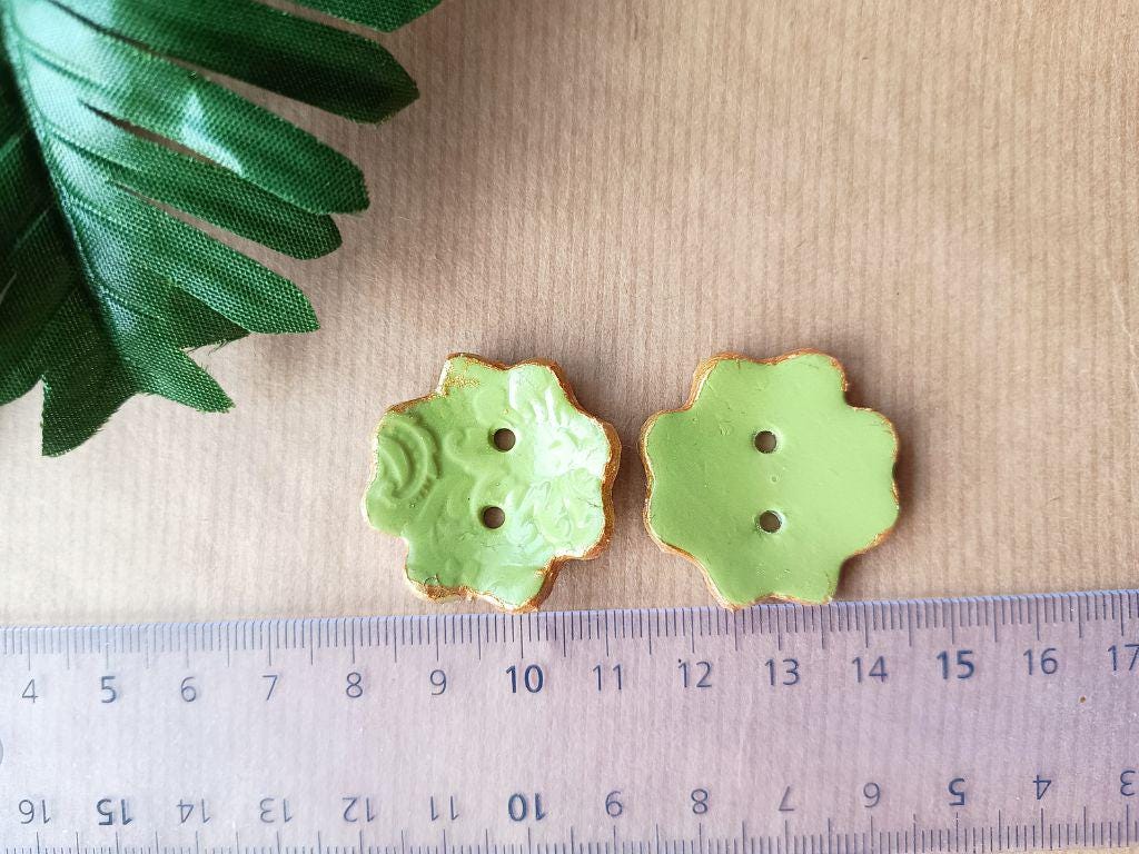 Handmade clay buttons for sewing, knitting or crocheting projects. Set of 4 buttons. Flower shape approx. 33 mm in diameter.