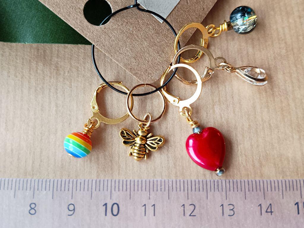 Stitch marker set of 5 with pendants and beads for knitting and crochet projects.
