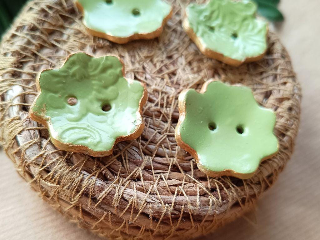 Handmade clay buttons for sewing, knitting or crocheting projects. Set of 4 buttons. Flower shape approx. 33 mm in diameter.