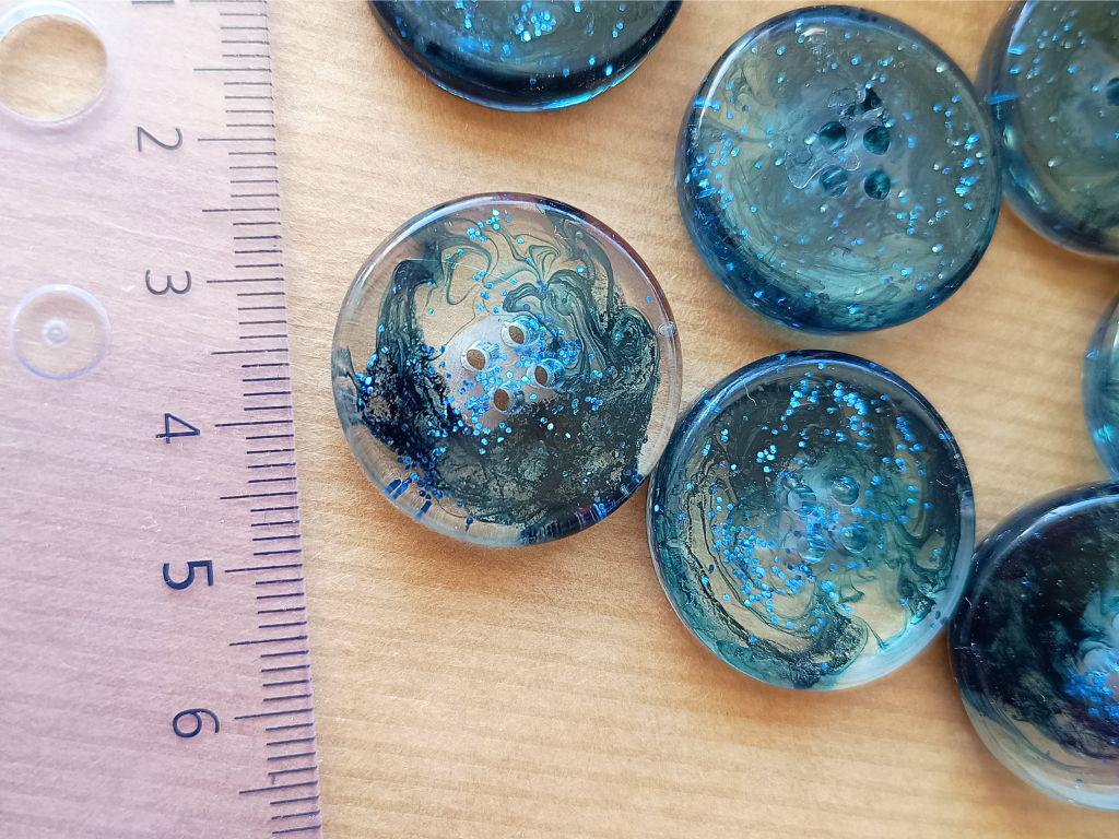 Handmade buttons for sewing, knitting or crocheting projects. Set of 4 buttons. Approx. 25 mm in diameter. Navy blue with glitter.