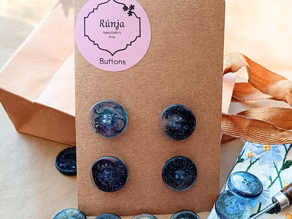 Handmade buttons for sewing, knitting or crocheting projects. Set of 4 buttons. Approx. 25 mm in diameter. Navy blue with glitter.