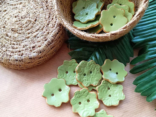 Handmade clay buttons for sewing, knitting or crocheting projects. Set of 4 buttons. Flower shape approx. 33 mm in diameter.