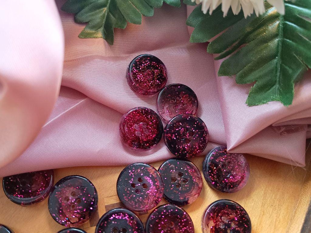 Handmade buttons for sewing, knitting or crocheting projects. Set of 5 buttons. Approx. 20 mm in diameter. Dark brown with pink glitter. Resin