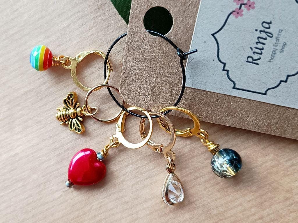 Stitch marker set of 5 with pendants and beads for knitting and crochet projects.