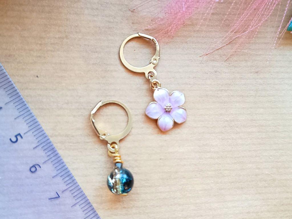 Stitch marker set with pendants and beads for knitting and crochet projects.