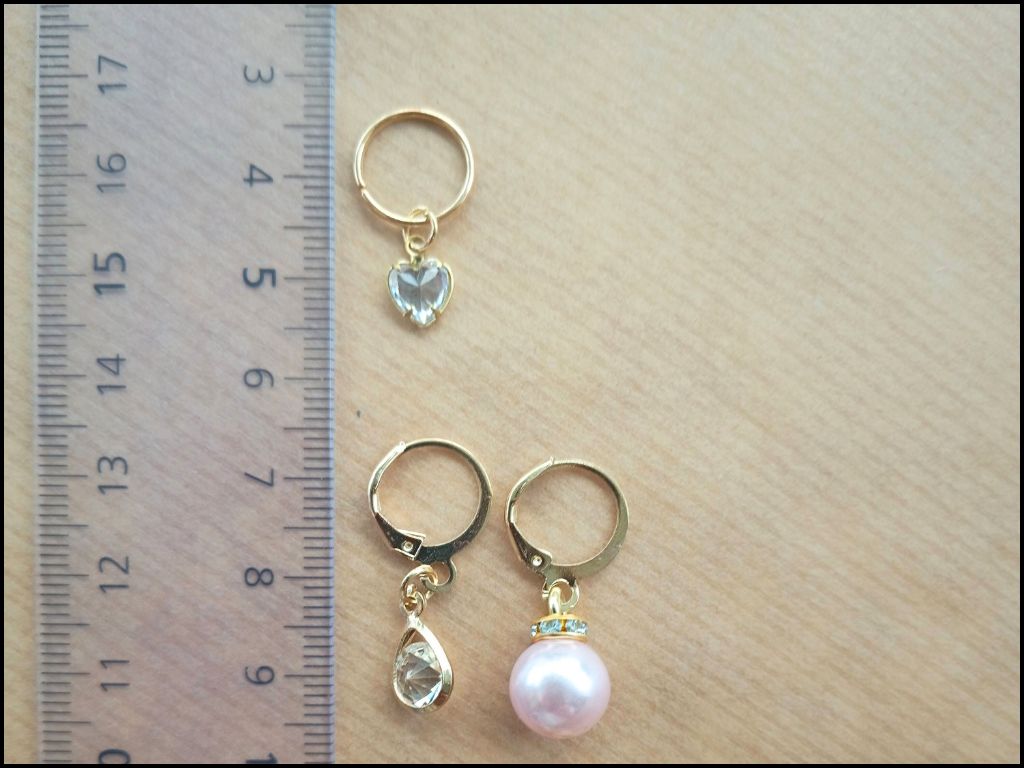Stitch marker set with flowers, dress, pearl and drop pendant for knitting and crochet projects. 