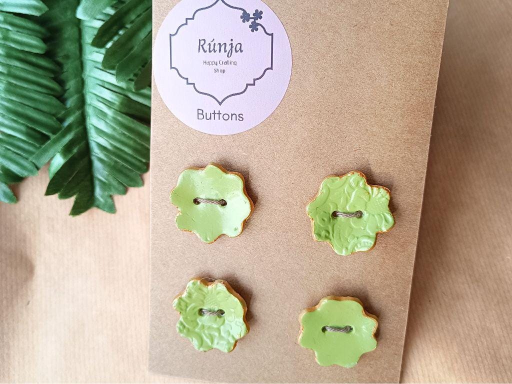 Handmade clay buttons for sewing, knitting or crocheting projects. Set of 4 buttons. Flower shape approx. 33 mm in diameter.